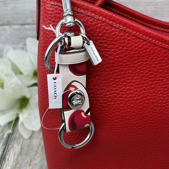 Coach Handbags - Trigger Snap Bag Charm With Cherry Print Wallet Bag Purse